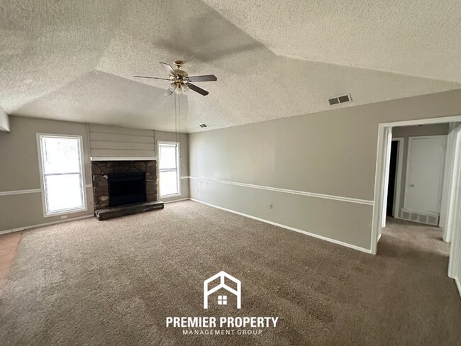 Building Photo - Charming 3BR/2BA in Country Brook | Vaulted Ceilings, Fireplace & Fenced Yard