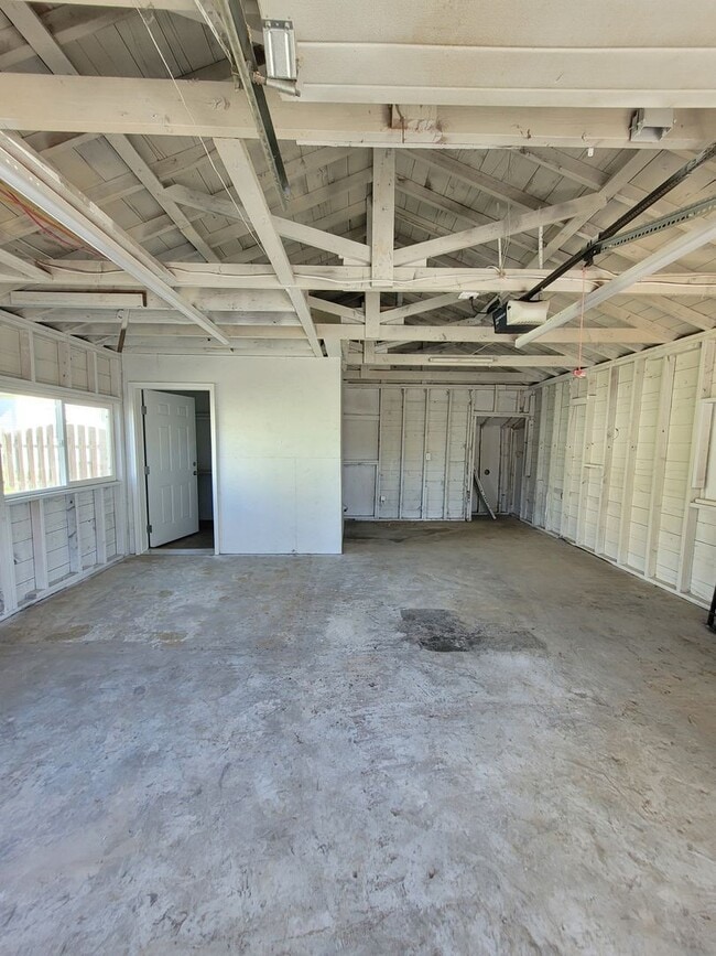 Building Photo - Free May rent with 1 Year Lease - Fully Remodeled with Garage & Yard Care Included
