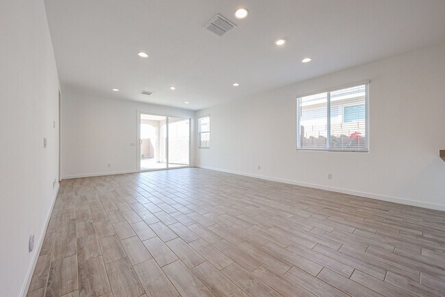 Building Photo - COMING SOON!! Recently built 5-Bedroom Home in Goodyear with Upgrades & Resort-Style Amenities