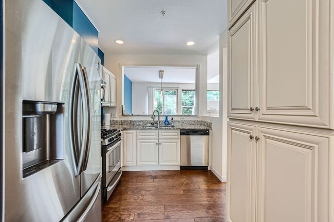 Building Photo - Ideally Located 3 Bed 3.5 Bath w/ Attached...