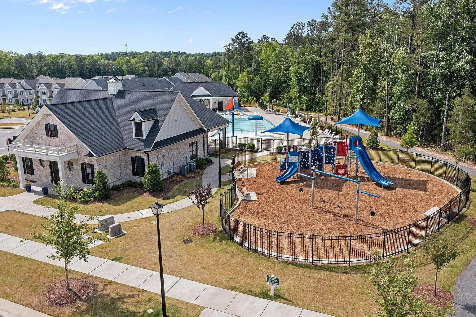 neighborhood pool and playground access included with rent - 1408 Latham Garden Dr