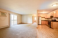 Aspen Village - 2BR, 1BA – 900SF - Living Room and Kitchen - Aspen Village