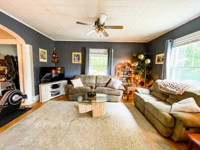 Living Room - historic tin ceilings - 415 Highland St
