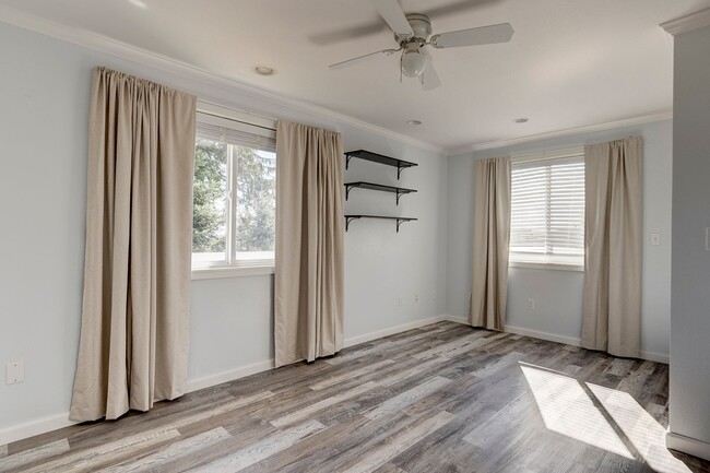 Building Photo - Spacious 2-Story Split-Level Home with Wat...