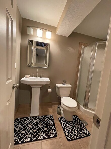 Half Bath by Garage Entry - 13846 W 154th Ter