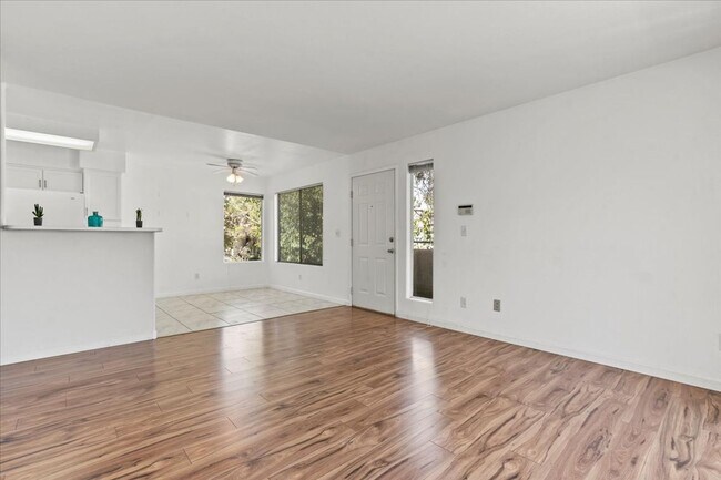 Building Photo - Bright, Modern 2 Bedroom Upstairs Condo, Community Pool, Gated, Covered Parking