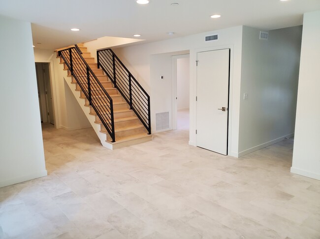 Stairs to master, West bedroom, and front closetDining room and stairs - 4320 Bel-Red Rd