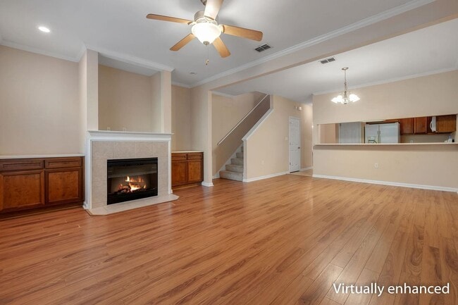 Building Photo - Spacious 3 Bedroom Townhome with Fireplace & Deck
