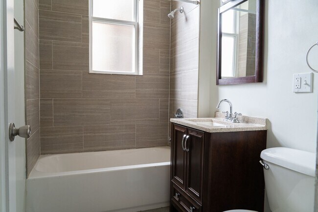 Building Photo - Uptown - 2 Bed / 1 Bath - In-Unit Laundry