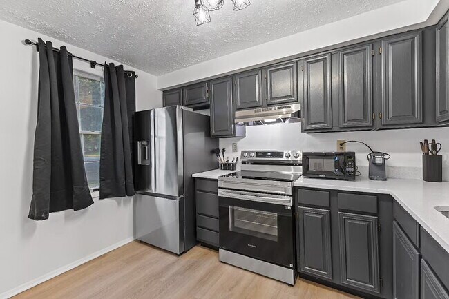 Building Photo - The Gunners Lake Gem | Modern 2BR Furnished Townhouse