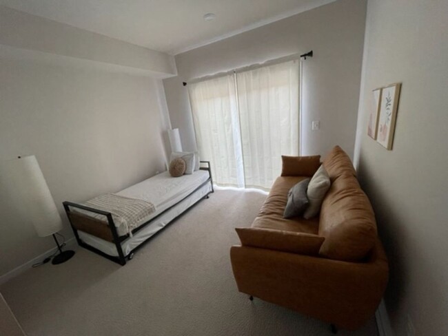 Building Photo - Modern 3BR Condo: Walk to Metro, 3 Miles f...