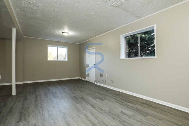 Building Photo - Move in before February 15th and choose your reward: a $250 Amazon Gift Card or a 55" Smart TV!