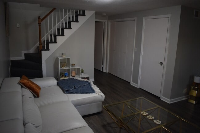 Downstairs living area + storage + laundry - 610 River Rouge Dr, Unit A