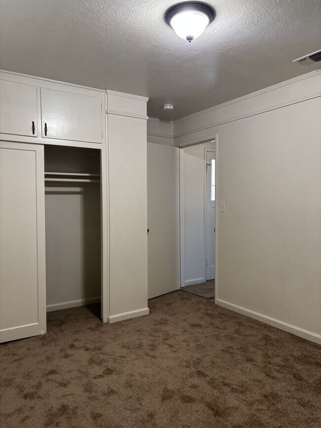 Building Photo - Updated 3 bedroom 2 bathroom home with large backyard, corner lot, close to shopping and schools ...