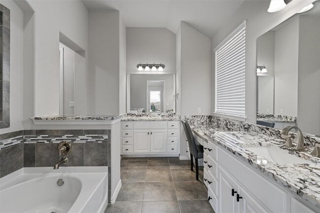 Building Photo - 404 Miracle Rose Way