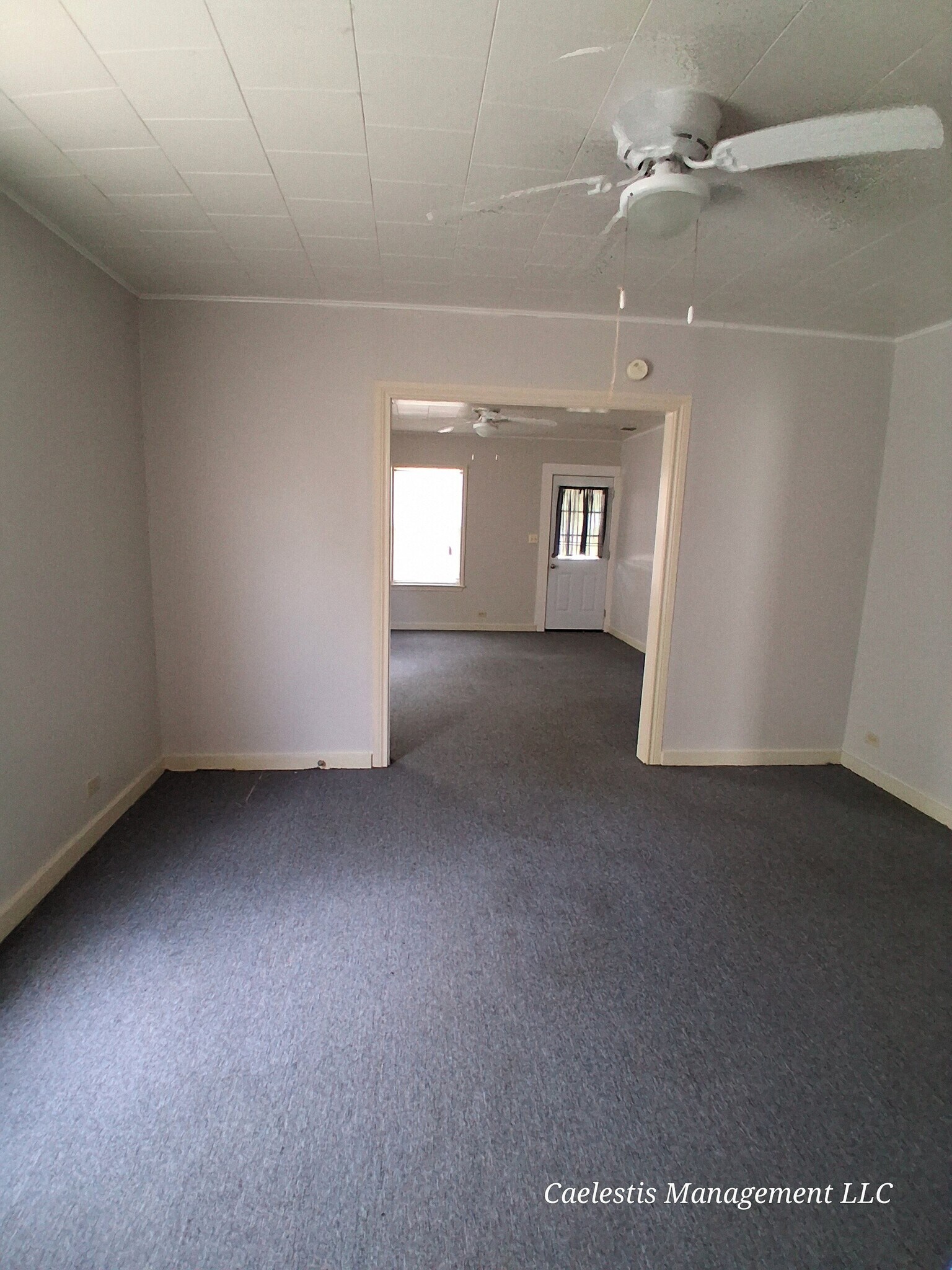 An open-concept dining and living room that blends style and comfort - 2412 8th St