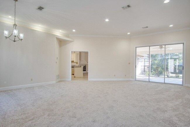 Building Photo - Festive Move-In Special! 4BR/3BA Lenox Gem – Fully Fenced Backyard & Military ½ Deposit