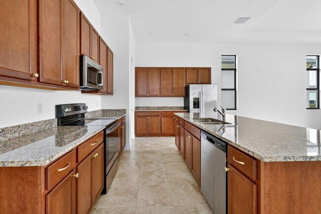 Building Photo - 11344 SW Pietra Wy