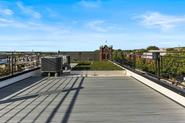 Building Photo - Private Double Decker Rooftop! - Modern Lu...
