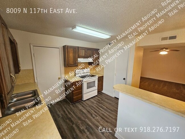 Building Photo - 8009 N 117th E Ave