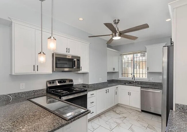 Building Photo - Stylish, Renovated Home Near Downtown Baltimore! W/D! Central Air! Close to Johns Hopkins Main Ca...