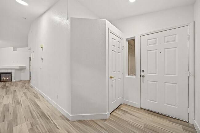 Building Photo - Charming and spacious single-story townhome nestled within a gated community in the desirable Nor...