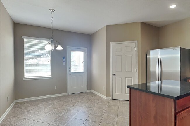 Building Photo - 7418 Jacobs Well Dr