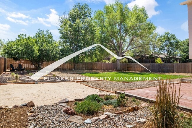 Building Photo - Updated 4 Bed, 2 Bath Home in Briargate with Mountain Views, fully fenced yard, 2 car garage and AC