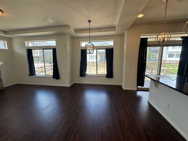 Building Photo - Luxury Corner Lot Home in Banning Lewis with Finished Basement, Wet Bar & Designer Upgrades