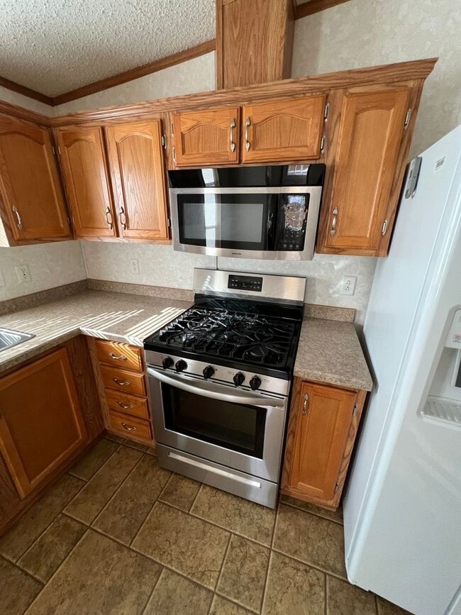 Building Photo - 3 Bedroom 2 Bath Modular Home with Many Amenities & Storage Shed