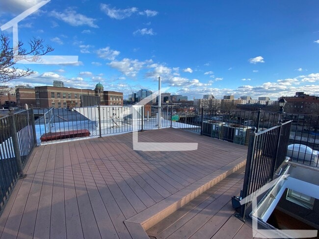 Building Photo - Private Roof Deck, Central Heat/AC, In-Unit Washer and Dryer, Pets Friendly Unit, Luxury Finishes