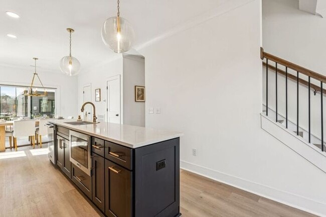 Building Photo - High-End 2BR Townhome | Rooftop Terrace + 2-Car Garage | 24-Unit Community