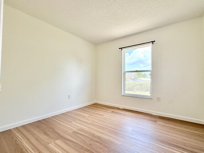 Building Photo - The perfect haven - 4Bedrooms / 2.5Bath family home at Orlando!