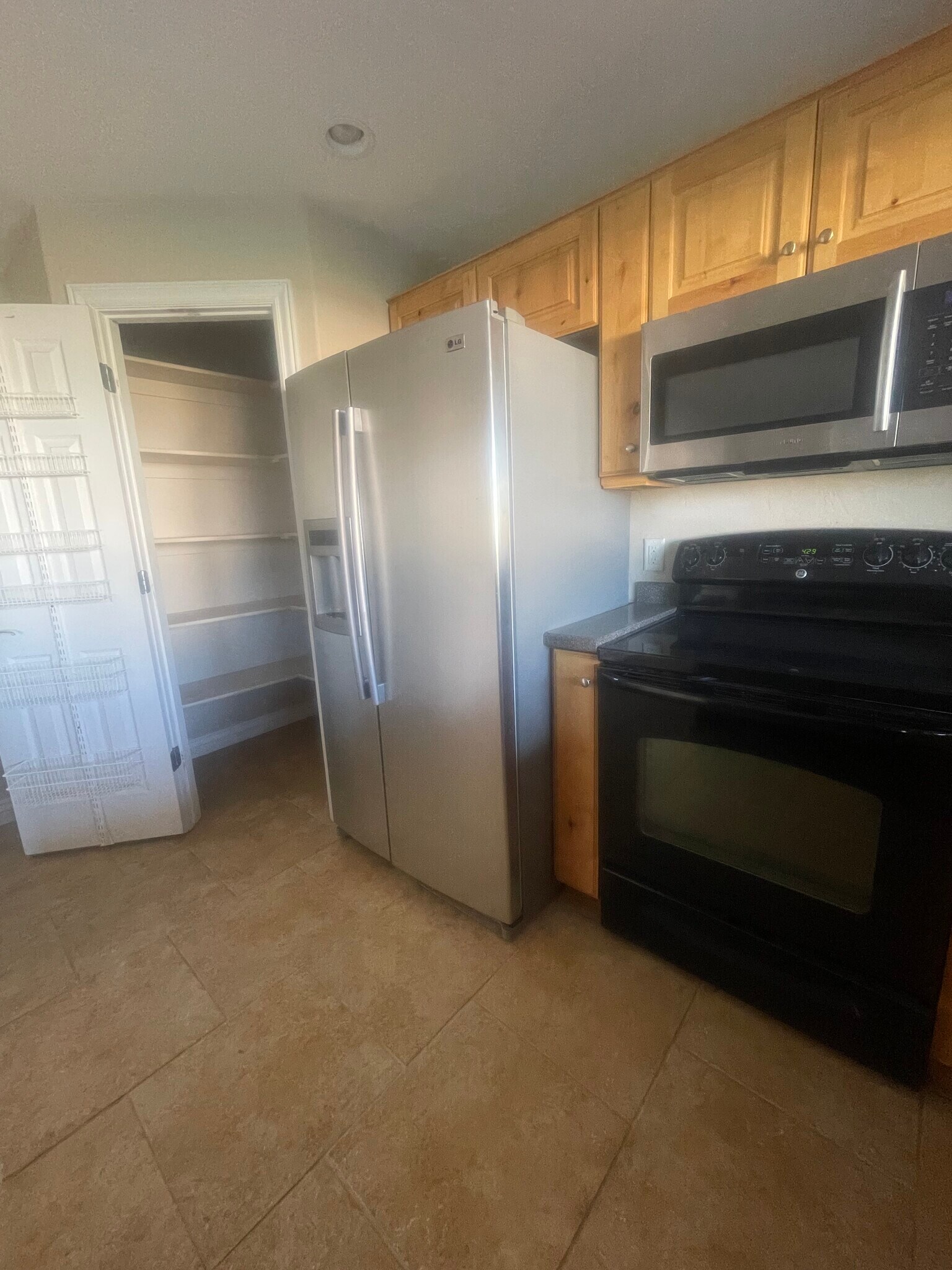 Kitchen and pantry - 143 E Box Elder Dr