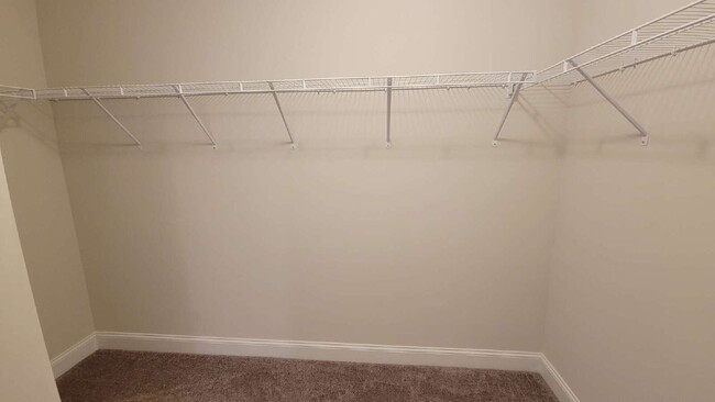 Building Photo - "Spacious 4-Bedroom Retreat with Modern Gr...