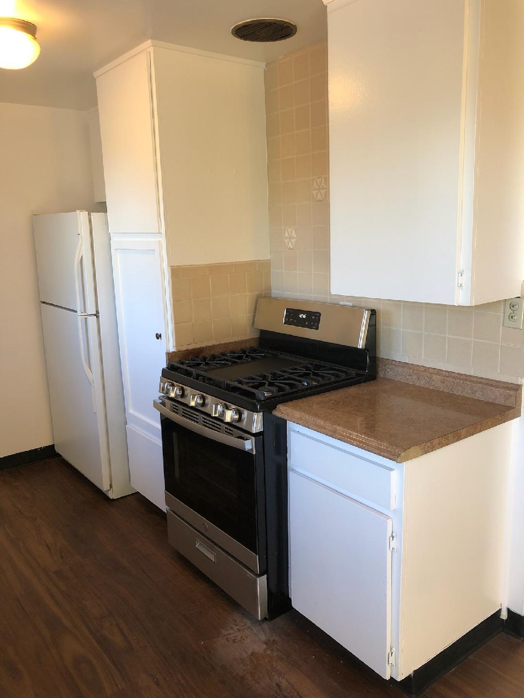 Stove in Kitchen, Refrigerator has been replaced - 4607 Plaza Ln