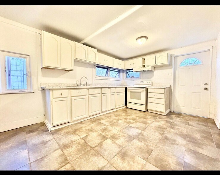 Building Photo - 1308 W 13th Ave