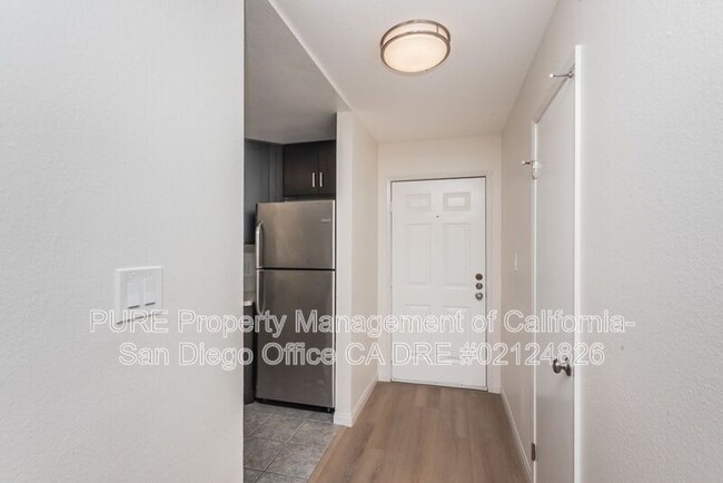 Building Photo - 7565 Charmant Dr