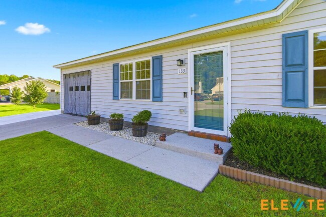 Building Photo - Beautiful Like-New 3 Bedroom Home with Huge Fenced Yard, Greenhouse & Storage