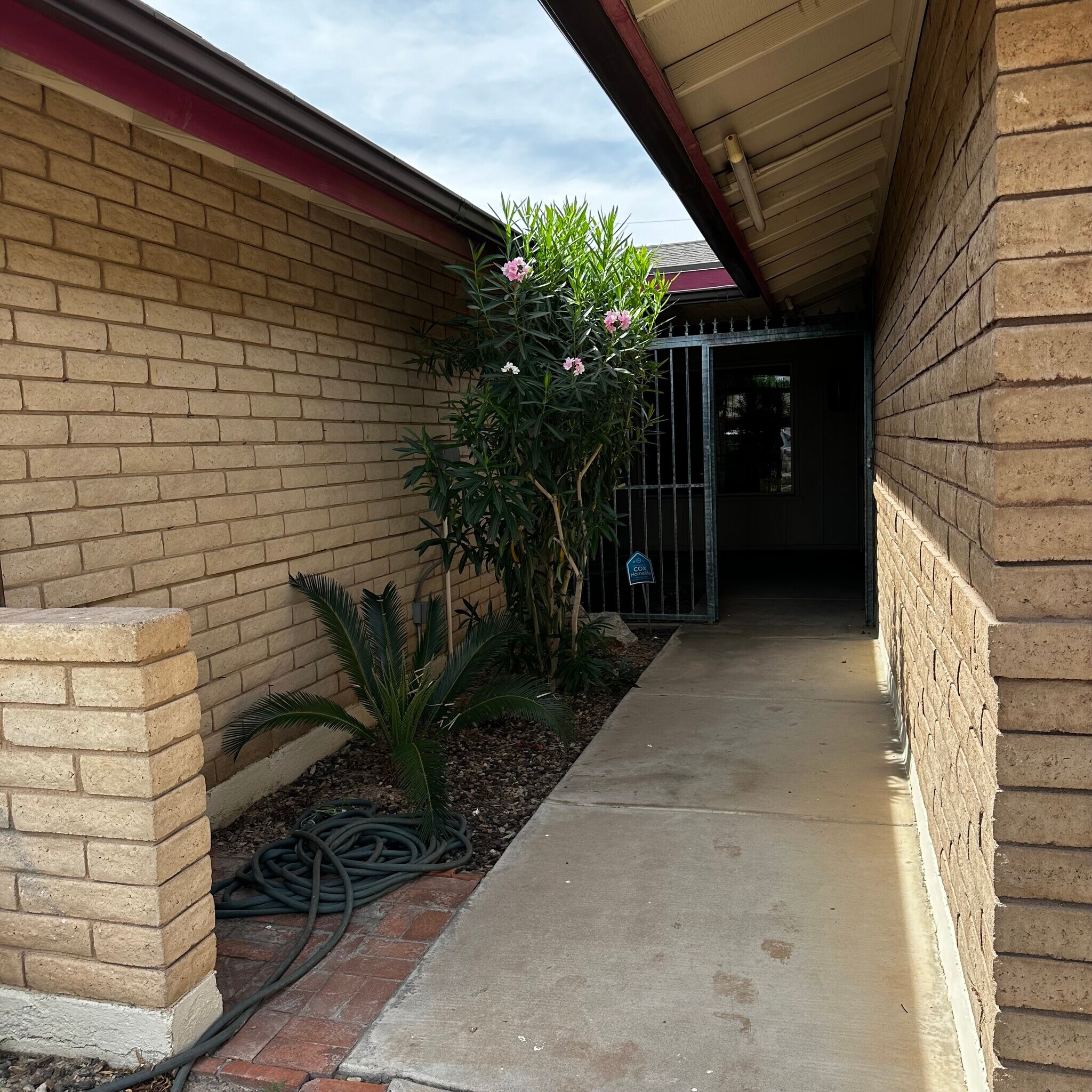 Entryway courtyard - 1207 E Loyola Dr