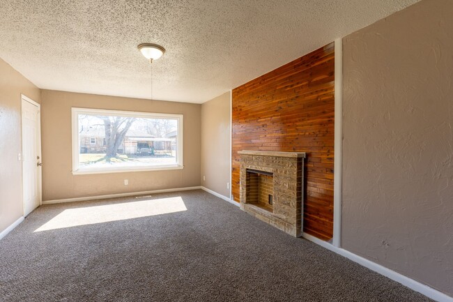 Building Photo - Welcome to your new 4-bedroom, 1.5-bathroo...