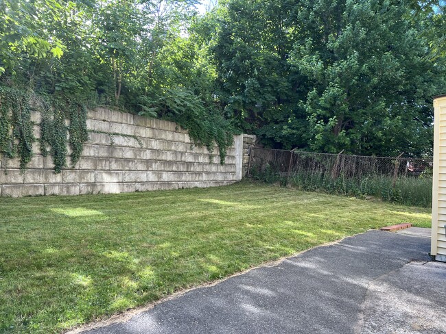 Backyard retaining wall - 5 Otisfield St