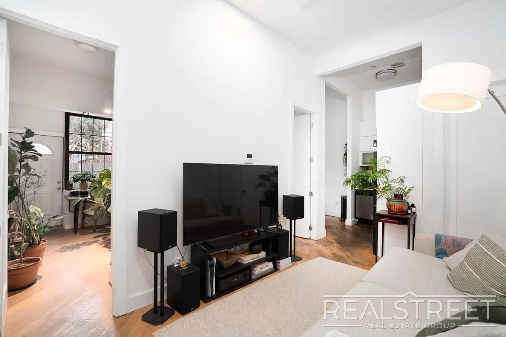 Building Photo - Prime Williamsburg 3-Bedroom with Private Backyard + Laundry in Building