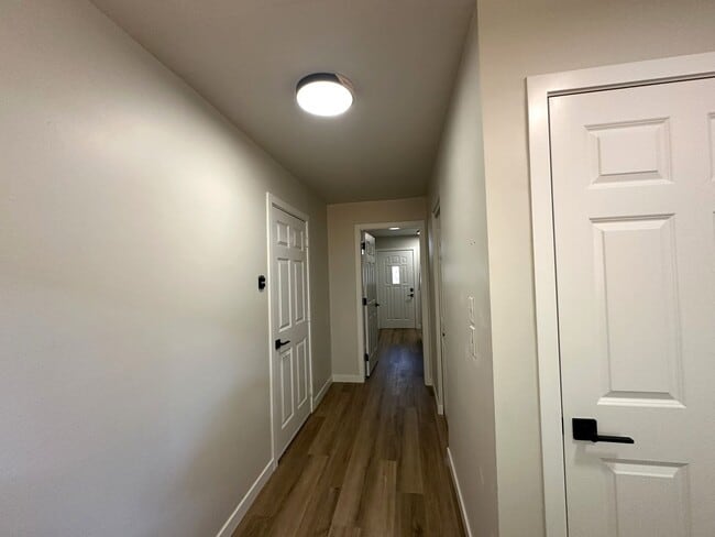 Building Photo - Updated 3-Story Condo with Balconies in So...