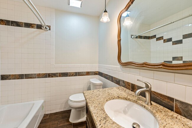 Building Photo - Homey Comfort with Spacious Yard in North Austin