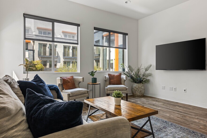 Living Room. TV Mount with wire hiding conduit - 215 Elm Ave