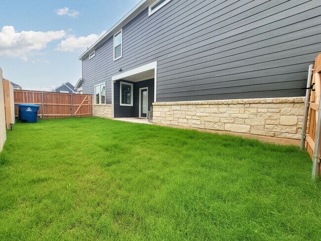 Building Photo - Spacious 4/BR 2.5/BA Retreat with Fenced Yard and Smart Features