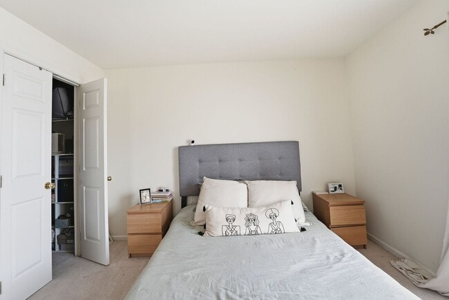 Building Photo - Bathed in natural light, this stunning second level condominium offers an effortless blend of com...