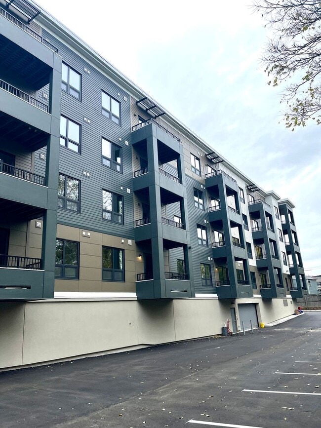 Building Photo - New building with garage parking