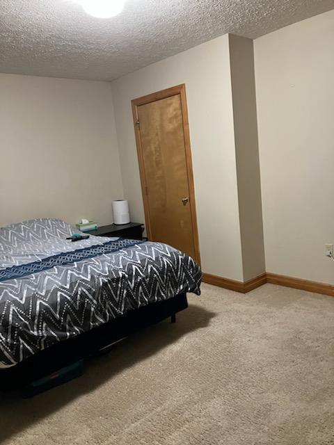 Main bedroom area hosts plenty of closet space and private bathroom. - 330 Warren St